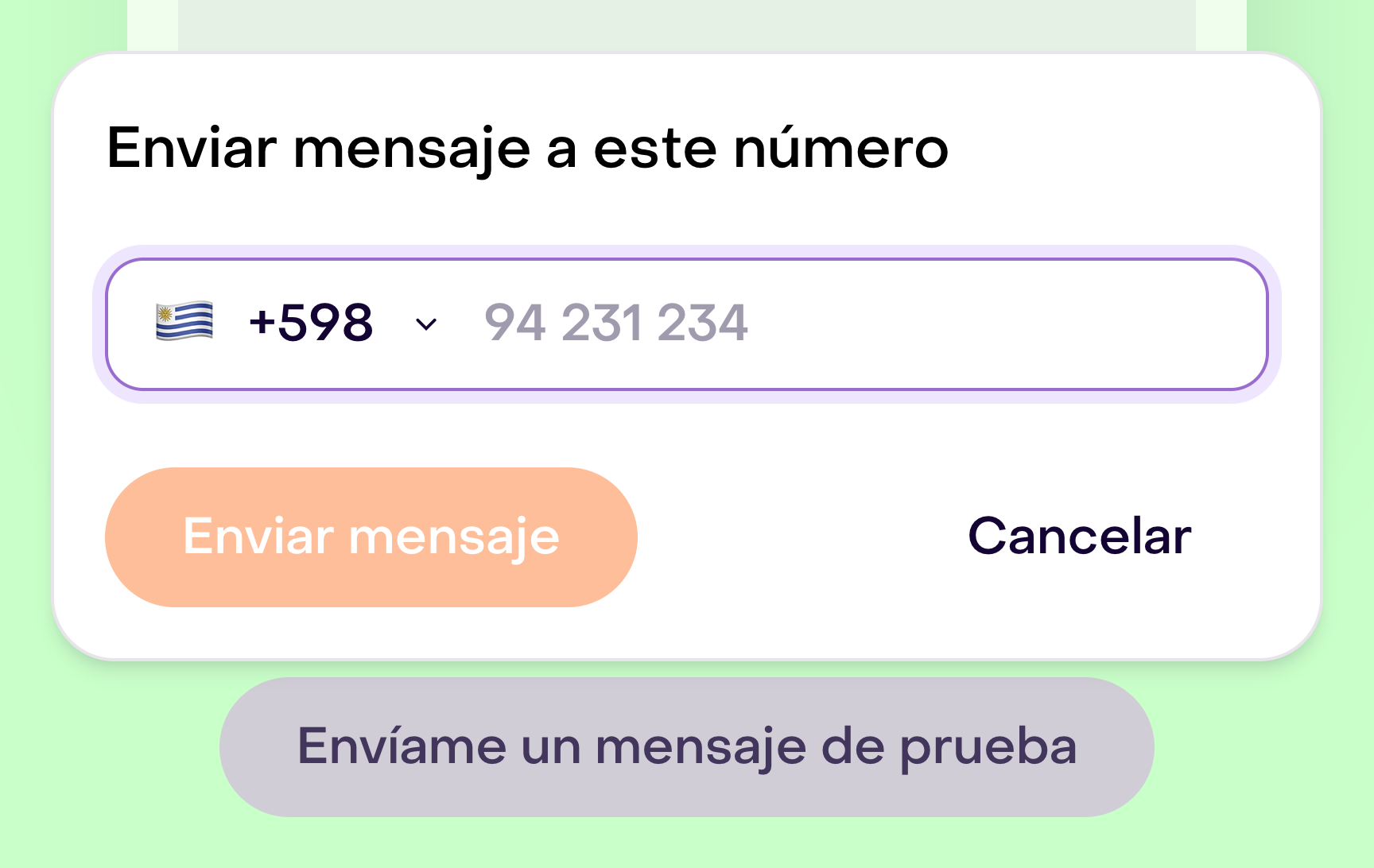 Formulario Enviar mensaje a este número con selector de país, campo de teléfono vacío, envío deshabilitado y el botón Envíame un mensaje de prueba.